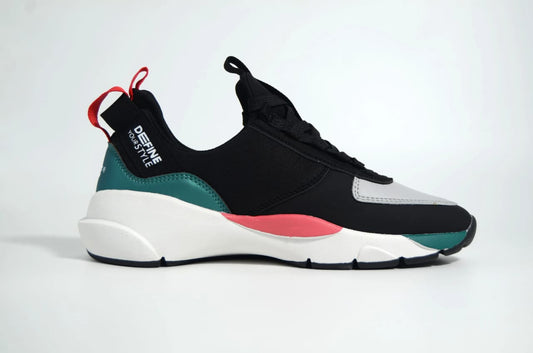 iTekkie sneaker. A Multicolored sneaker with black, white, red, and green accents on a light gray background